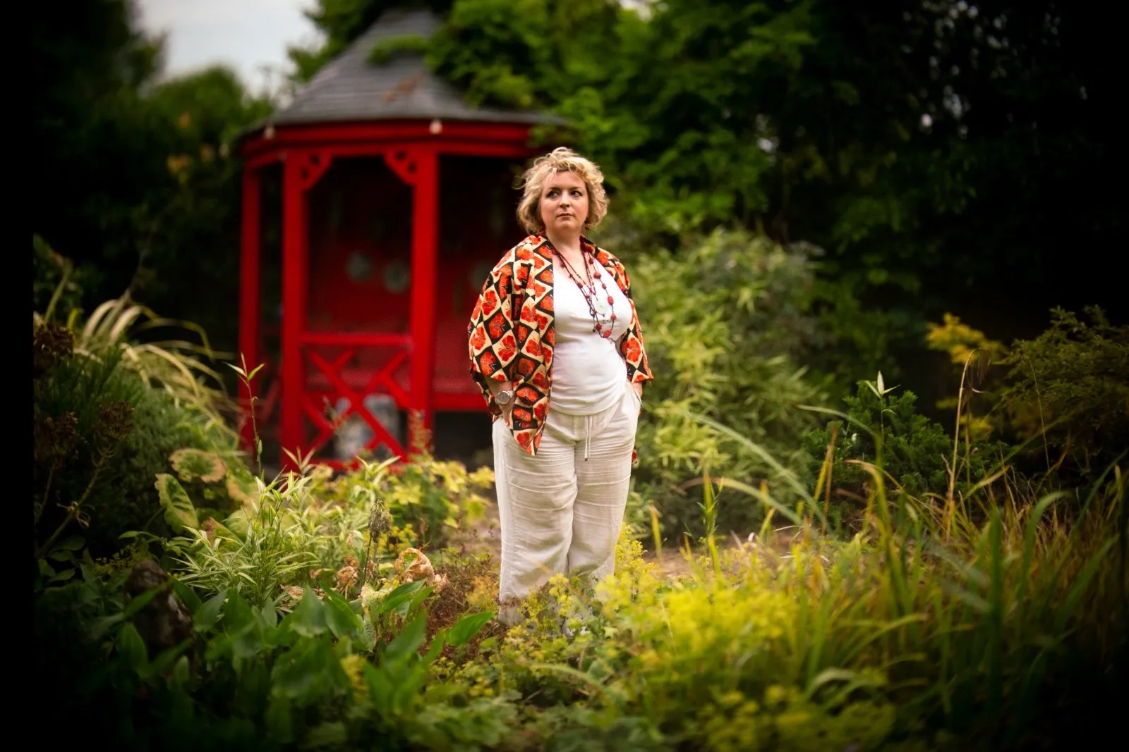 Charlotte in a Japanese garden she created with her late mother. Photo by Guy Bellingham