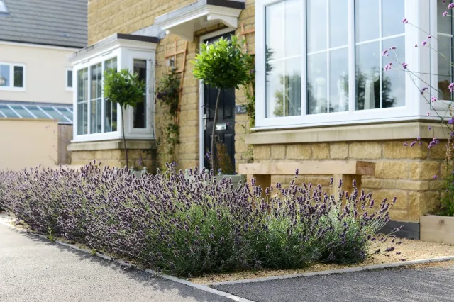 A view of an Arts and Crafts garden, in the style of Lutyens, designed by Capability Charlotte.